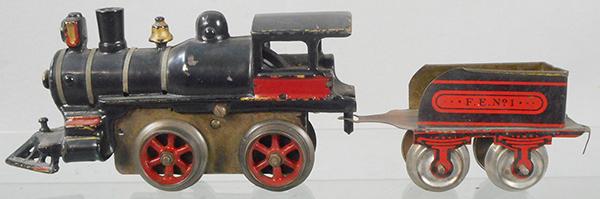 IVES 11 LOCO & TENDER: O ga, painted cast iron loco, no brake, windup working, FE1 tender w/hook coupler, ca 1906, C6-7.