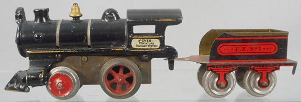 IVES LOCO & TENDER: O ga, painted cast iron, loco has white nameplate, windup working, FE1 tender w/hook coupler, ca 1908, C7.