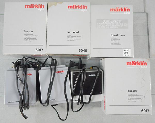 MARKLIN ACCESSORIES: HO ga, 2 #6017 booster, 6040 keyboard, 6001 transformer, these have orig boxes, 3 transformers, no orig boxes, C7-9.
