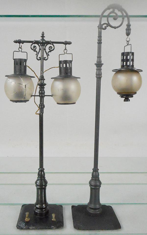 2 BING STREET LAMPS: O ga, electric, 532/13 w/1 cracked & repaired glass globe, 13 in tall, 532/11 single lamp, 15 in tall, globe broken & repaired, entire pole repainted, C6-7.
