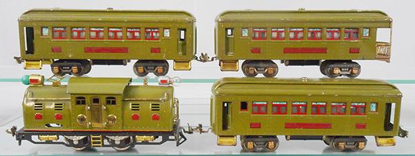 LIONEL TRAIN SET: O ga, 254E loco, E is rubberstamped on door, die cast wheels fatiguing, 2 #605 Pullmans, 606 obsv, set is olive green, cars have green doors w/maroon trim, C6-8.