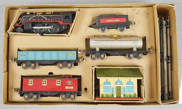 LIONEL 1054 TRAIN SET: O ga, 1681 electric loco, 1661T tender, 1677 gondola, 1680 tank, 1682 caboose, 1027 transformer, track, orig set box & insert minor wear, C7-8.