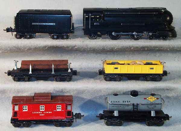 LIONEL TRAIN SET: O ga, 238 loco, 2225W tender, 3651 lumber dump car, 3652 side dump car, restored, 2654 Sunoco tank, repainted, 2657 caboose, C4-6.