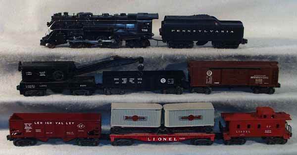 LIONEL TRAIN SET: O ga, 736 Berkshire loco, 2671WX tender, 6460 derrick, 2452X gondola, 2458 PA box car, 6456 hopper, 6430 flat w/Cooper-Jarrett vans, 6257 caboose, C5-7.