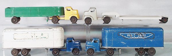 4 RALSTOY FORD TRUCKS: die cast, Lowloader, Lowside Trailer, Haechl Trailer, worn lettering on 1 side, Red Ball Trailer, both trailers have glue residue, C4-5.
