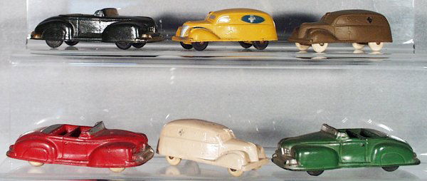 SUN & AUBURN RUBBER AUTOS: 3 Auburn Rubber 1946 Lincoln Convertibles, 4 3/4 in long, both headlight types; 3 Sun Rubber 1937 Ambulances, 3 3/4 in long, all have minor warping, C5.