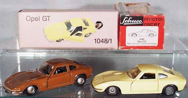 2 SCHUCO 1048/1 OPEL MICRO RACERS: both are windup working, the yellow plastic version is by Schuco, the brown die cast version is by Nutz, both w/keys, orig boxes minor wear, C8-9.