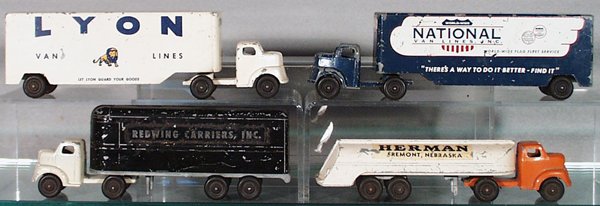 4 RALSTOY FORD TRUCKS: Lyon & National Moving Vans, Red Wing Carriers, Herman Tanker, playworn, C2-3.
