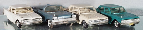4 PROMO AUTOS: plastic, 1962 Mercury, missing 1 indicator light, friction not working, AMT 1959 Mercury Park Lane, tin base, friction not working; 2 1960 Comets, warped, 1 indicator light broken, all have some oxida
