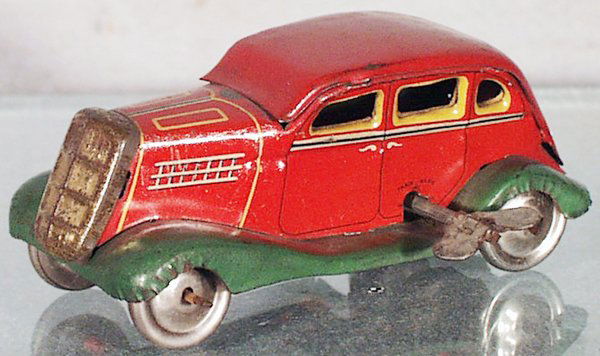 1934 FORD SEDAN: prewar Japan, litho tin, windup working, 4 1/2 in long, grille tarnished, C5-6.