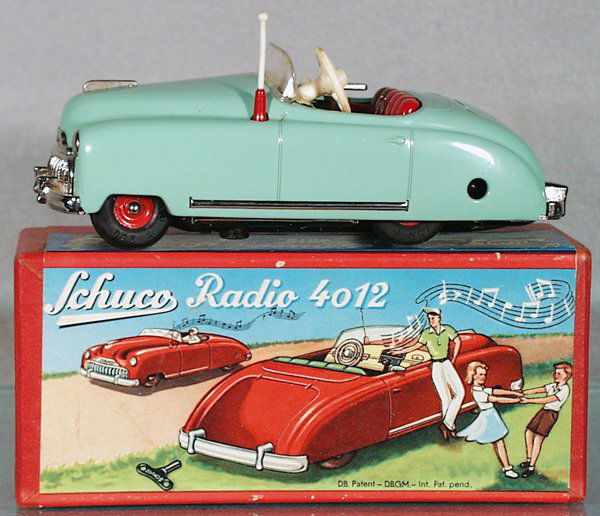 SCHUCO 4012 RADIO AUTO: turquoise, windup working, plays "Moulin Rouge", w/instructions & key, orig box, C8-9.