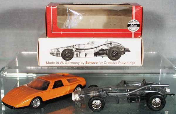 2 SCHUCO MICRO RACERS: 351 132 Mercedes, orange, R276 Watson Indy Racer, clear plastic, both are windup working, both have a minor body warp, orig boxes minor wear, C6-8.