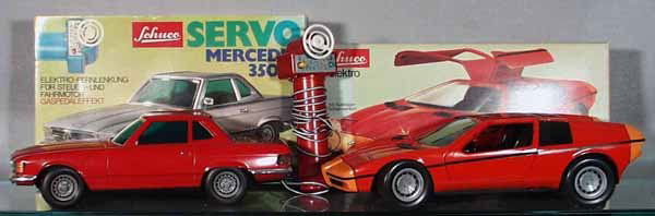 2 SCHUCO AUTOS: 351 225 Servo Mercedes 350SL, mirror loose but there; 351 226 BMW Turbo, both are plastic, battery operated, working, orig boxes minor wear, C8-9.