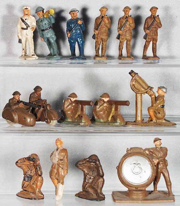 14 AUBURN RUBBER FIGURES: 3 #A1, A4, 2 #A13, A22, gun tip broken, 2 #A18, A17, A24, A31, A14, Policeman, some normal wear, C3-5.