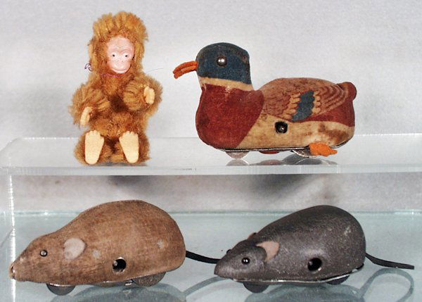 4 SCHUCO ANIMALS: Monkey, 3 1/2 in tall; 710 Duck, missing 1 foot; 922 Mikifex, some bare spots; 921 Mikifex, 3 are windup working, C4-6.