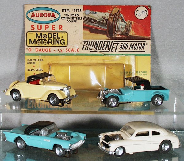 4 AURORA THUNDER JETS: 1753, 36 Convertible Coupe, w/worn orig card; 29 Hot Rod, 57 T-Bird, 1755 1948 Ford Coupe, C6-8.