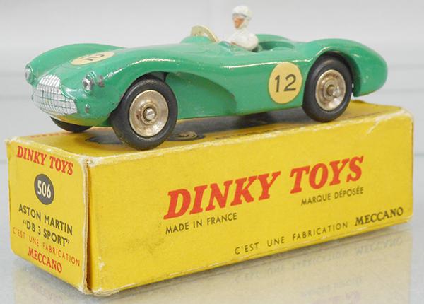 FRENCH DINKY 506 ASTON MARTIN: green w/metal hubs, orig box minor wear, C8.