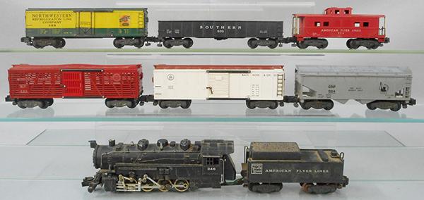 AMERICAN FLYER TRAIN SET: S ga, 346 switcher w/smoke, choo choo & air chime whistle, last set of drivers not connected to main drive rod, 629 stock, 933 B&O box car, 924 hopper, 989 Northwestern box car, orange label, 920 gond