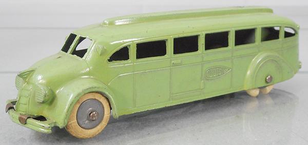 TOOTSIETOY 1026 JUMBO BUS: early version, green, w/TOOTSIE on sides, tin chassis rubber tires worn, 1 tire split, C8.
