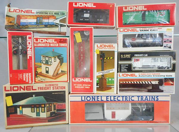 LIONEL ACCESSORIES: O ga, 2031 Lumber Mill, 2133 Freight Station, 2319 Watch Tower, 2154 Crossing Sign, finial broken, 2314 Searchlight Tower, 2151 Semaphore, 2152 Crossing Gate, 9301 mail car, 9172 caboose, 9749 box car