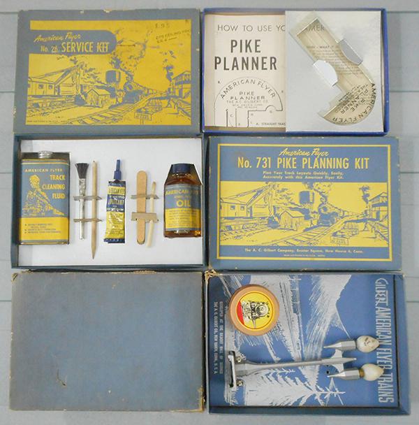 3 AMERICAN FLYER ACCESSORIES: S ga, 731 Pike Planning Kit, 26 Service Kit, used but complete, 580 Double Arc Lamp, orig boxes & inserts minor wear, C6-7.