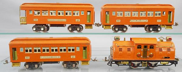 LIONEL 142E TRAIN SET: O ga, 254E loco, pendulum reverse, 1 die cast wheel has chips, 2 #605 Pullmans, 606 obsv, set is orange, cars have green doors & cream inserts, orig boxes rough, orig set box worn, C6-7.