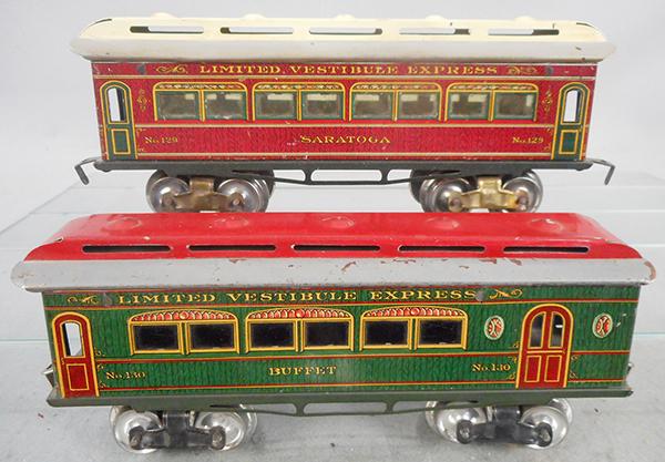 2 IVES COACHES: O ga, litho & handpainted tin, 129 Saratoga coach, red w/white & gray roof, 130 Buffet coach, green w/red & gray roof, gray paint is flaking, ca 1910, C6-7.