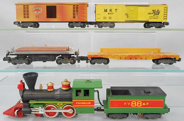 AMERICAN FLYER TRAIN SET: S ga, 21088 Franklin loco & tender w/smoke & choo choo, 914 lumber car, 65 cannon flat, incomplete, 55 box car, 937 Katy box car, oxidation on door guides, C6-7.