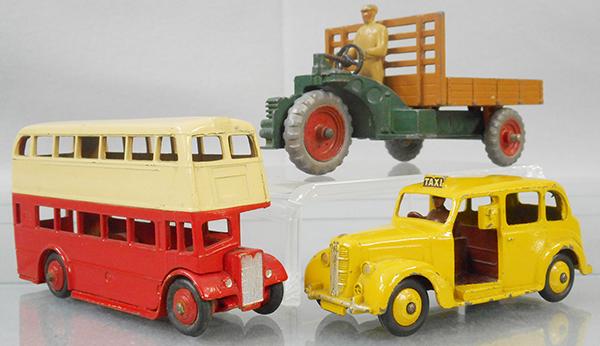 3 DINKY VEHICLES: 29C Double Decker Bus, red & cream, 27C Motorcart, green & tan, 40H Austin Taxi, yellow, C6.