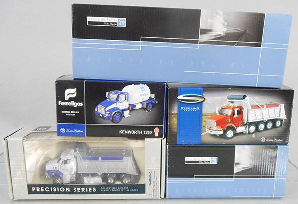 5 TONKAN REPLICAS: Flatbed Trailer, Kenworth T300, Sterling Dump Truck, Peterbilt Dump Truck, Sterling Dump Truck, orig boxes & inserts minor wear, C8-9.