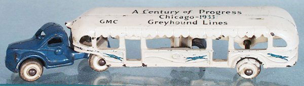 ARCADE CHICAGO CENTURY OF PROGRESS BUS: GMC Greyhound, 1933, painted cast iron, 7 1/2 in long, C5-6.