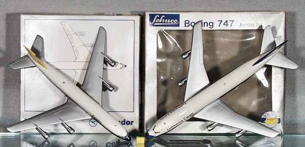 2 SCHUCO JETS: 385300 Condor Boeing 707, 385301 Lufthanse Cargo Boeing 747, windup working, has scratch, orig boxes minor wear, C9-10.