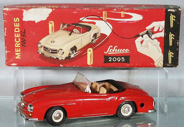 SCHUCO 2095 MERCEDES 190SL: red, clockwork working, all tire rims melted, replacement windshield warped & glued in, orig box worn, C5.