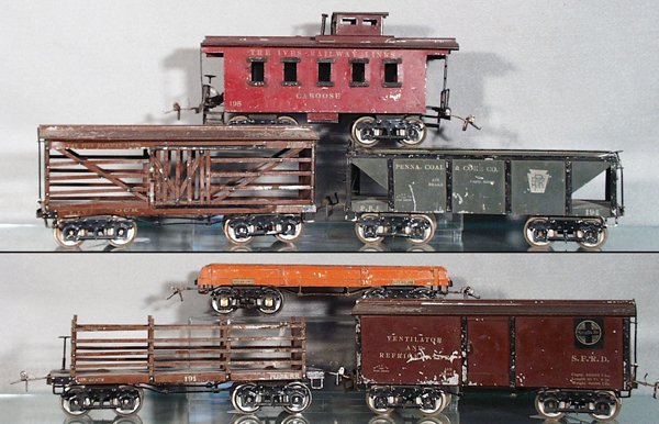 6 IVES FREIGHT CARS: std ga, 194 Hopper, 193 Stock, missing both couplers & brakewheel, 192 Box Car, missing brakewheel, 191 Coke, missing 1 side strip, 196 Flat, 195 Caboose, missing 1 step & chimney support, overall all