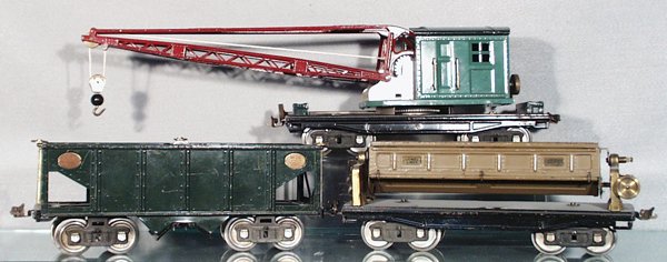 3 LIONEL FREIGHT CARS: std ga, 219 Derrick, some touch up spots on cab; 216 Hopper; 218 Auto Dump, missing crown gear, C5-6.