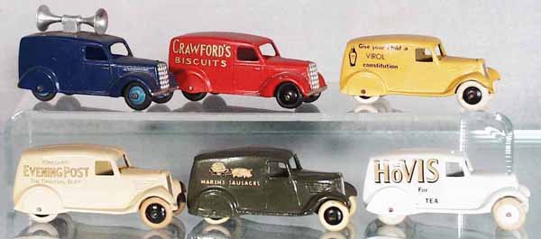 5 DINKY DELIVERY VANS: 492 Loudspeaker Van, 28G Crawford's, 28G Virols, white metal copy, Evening Post, Marsh's Sausages, white metal copy, Houl's Tea, white metal copy, all but Loudspeaker Van are restored, C7-9.