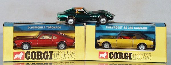 3 CORGI AUTOS: 276 Oldsmobile Toronado, orig box waterdamaged; 338 Chevy Camaro, orig box has price tag tears; 300-A1 Chevy Corvette Sting Ray Coupe, C8-9.
