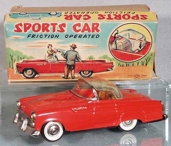 TN 1955 FORD THUNDERBIRD: Japan, lithographed tin, friction working, red w/black rubber tires, 7 3/4 in long, orig box rough, C9.