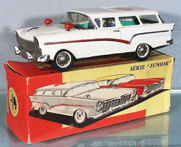 JOUSTRA 1957 FORD AMBULANCE: France, lithographed tin, white w/red trim & black rubber tires, friction working, 11 3/4 in long, orig box minor wear, C8-9.