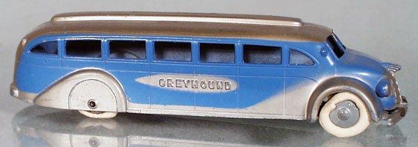 TOOTSIETOY 1045 GREYHOUND BUS: w/tin chassis, tires have flat spots, C7.