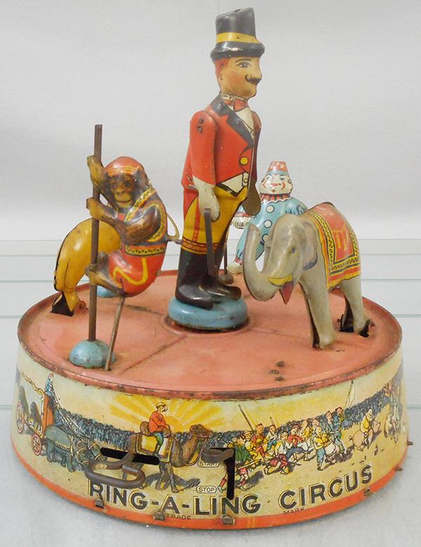 MARX RING-A-LING CIRCUS: litho tin, 7 3/4 in wide, works erratically, C6-7.
