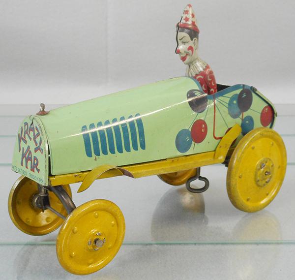 UNIQUE ART KRAZY KAR: litho tin, 7 in long, windup working, C7-8.