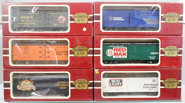 6 DELTON FREIGHT CARS: G ga, 4258M Hoods, 4257-2 California Fruit, 4258-BU Strohs, 4255W Westinghouse, 4255R Red Man, 4255A6 Bud Light, orig boxes & inserts minor wear, 1 missing window, C8.