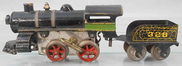 AMERICAN FLYER 12 LOCO: O ga, painted cast iron, windup working, 7 in long, green stripe, missing drive rods, 328 tender, black, finish alligatored, missing rear coupler, ca 1910, C5-6.