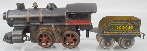 AMERICAN FLYER #12 LOCO & TENDER: O ga, painted cast iron, windup working, 7 in long, red stripe, missing drive rods, 328 tender, black, finish alligatored, ca 1914, C5-6.