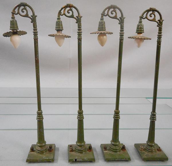 4 IVES 306 STREET LAMPS: std ga, 12 in tall, 1 has cracks on die cast base, another has repairs to base, ca 1928, C6-8.
