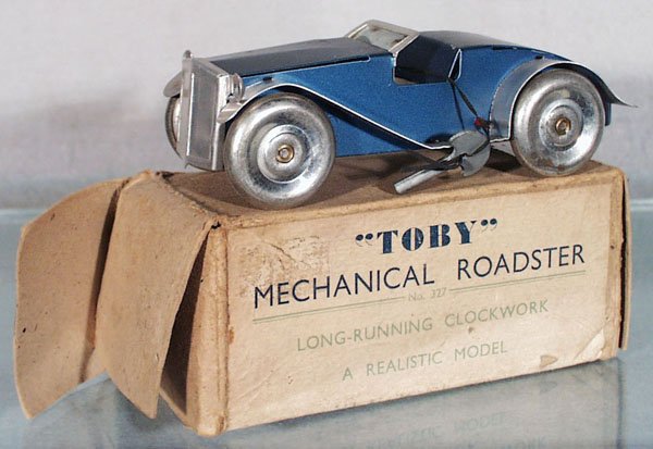 MG MAGNETTE 327 TOBY ROADSTER: tin, clockwork working, 6 1/4 in long, orig box worn, C8.