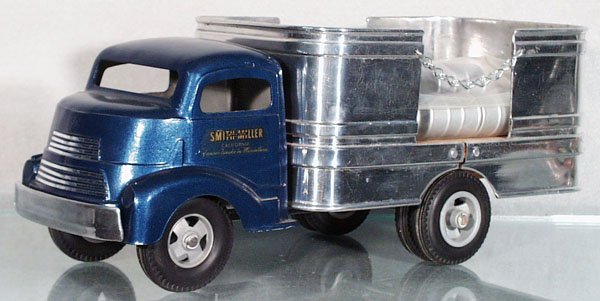 SMITH MILLER OIL TRUCK: die cast & pressed steel, 14 in long, w/barrels, restored, C8.