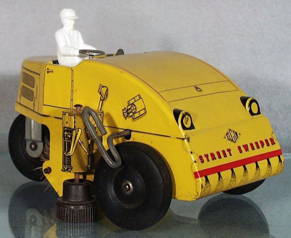 NYLINT 1100 ELGIN STREET SWEEPER: litho tin, 8 1/4 in long, clockwork working, C8.
