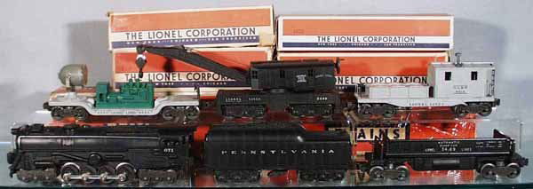 LIONEL 2153WS TRAIN SET: O ga, 671 loco, 2671W tender, 1 rear step cracked, 3469X operating dump car w/bin, 6520 green searchlight car, 2460 derrick, 6419 work caboose, hairline crack by smokestack, orig boxes & set box rough